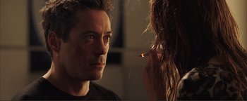 Movie still from “Kiss Kiss Bang Bang” (2005), directed by Shane Black – A man and a woman are looking in the same direction; Close Up shot, Over the shoulder angle