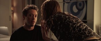 Movie still from “Kiss Kiss Bang Bang” (2005), directed by Shane Black – A man and a woman in front of a mirror; Close Up shot, Over the shoulder angle