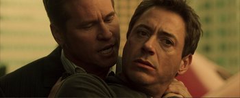 Movie still from “Kiss Kiss Bang Bang” (2005), directed by Shane Black – A man and a woman looking at one another; Close Up shot, Over the shoulder angle