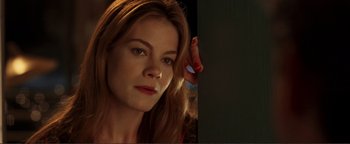 Movie still from “Kiss Kiss Bang Bang” (2005), directed by Shane Black – A person with long blonde hair; Close Up shot, Low angle
