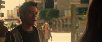 Movie still from “Kiss Kiss Bang Bang” (2005), directed by Shane Black – A person on a city street; Close Up shot, Over the shoulder angle