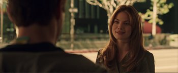 Movie still from “Kiss Kiss Bang Bang” (2005), directed by Shane Black – A woman sitting in front of another woman; Close Up shot, Over the shoulder angle