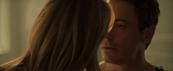 Movie still from “Kiss Kiss Bang Bang” (2005), directed by Shane Black – A man and a woman face to face; Extreme Close Up shot, Over the shoulder angle