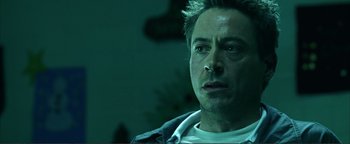 Movie still from “Kiss Kiss Bang Bang” (2005), directed by Shane Black – A person wearing a jacket; Close Up shot, Over the shoulder angle