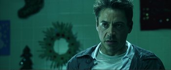 Movie still from “Kiss Kiss Bang Bang” (2005), directed by Shane Black – A person wearing a jacket; Close Up shot, Over the shoulder angle