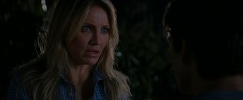 Movie still from “Knight and Day” (2010), directed by James Mangold – A person wearing a plaid shirt; Close Up shot, Over the shoulder angle