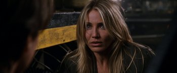 Movie still from “Knight and Day” (2010), directed by James Mangold – A person with long blonde hair; Close Up shot, Over the shoulder angle