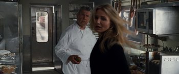 Movie still from “Knight and Day” (2010), directed by James Mangold – A man and a woman standing in a kitchen; Close Up shot, Over the shoulder angle