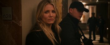 Movie still from “Knight and Day” (2010), directed by James Mangold – A person wearing a black jacket; Close Up shot, Over the shoulder angle