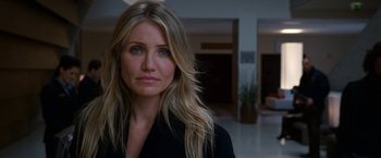 Movie still from “Knight and Day” (2010), directed by James Mangold – A person wearing a black shirt; Close Up shot, Over the shoulder angle