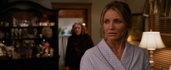 Movie still from “Knight and Day” (2010), directed by James Mangold – Two women standing in front of each other in a room; Close Up shot, Over the shoulder angle