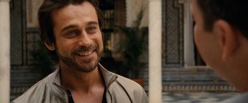 Movie still from “Knight and Day” (2010), directed by James Mangold – A person wearing a jacket; Close Up shot, Over the shoulder angle