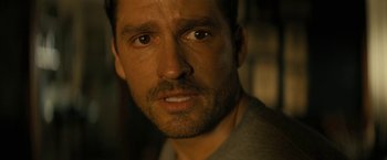 Movie still from “Knock at the Cabin” (2023), directed by M. Night Shyamalan – A person with a beard; Close Up shot, High angle