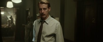 Movie still from “Kon-Tiki” (2012), directed by Espen Sandberg – A man in a dress shirt and a tie; Close Up shot, Low angle