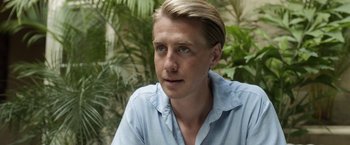 Movie still from “Kon-Tiki” (2012), directed by Espen Sandberg – A person wearing a blue shirt; Close Up shot, Low angle