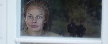 Movie still from “Kon-Tiki” (2012), directed by Espen Sandberg – A young woman looking out of a train window; Close Up shot, Over the shoulder angle