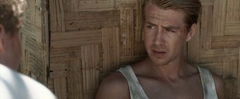 Movie still from “Kon-Tiki” (2012), directed by Espen Sandberg – A person wearing a white tank top; Close Up shot, Over the shoulder angle