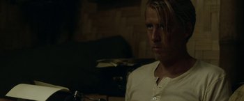 Movie still from “Kon-Tiki” (2012), directed by Espen Sandberg – A person with long blonde hair; Close Up shot, Over the shoulder angle