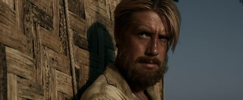 Movie still from “Kon-Tiki” (2012), directed by Espen Sandberg – A person with long hair and a beard; Close Up shot, Low angle