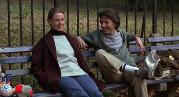 Movie still from “Kramer vs. Kramer” (1979), directed by Robert Benton – A man and a woman sitting on a park bench; Medium shot, Low angle