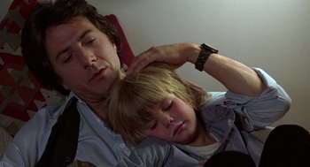 Movie still from “Kramer vs. Kramer” (1979), directed by Robert Benton – A man and a child sleeping on a couch; Close Up shot, Low angle
