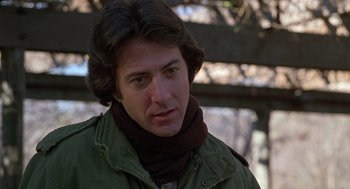 Movie still from “Kramer vs. Kramer” (1979), directed by Robert Benton – A person wearing a jacket and a scarf; Close Up shot, Over the shoulder angle