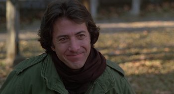 Movie still from “Kramer vs. Kramer” (1979), directed by Robert Benton – A person wearing a jacket and a scarf; Close Up shot, Over the shoulder angle