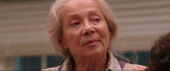 Movie still from “Krampus” (2015), directed by Michael Dougherty – An older woman with white hair looking at the camera; Close Up shot, Low angle