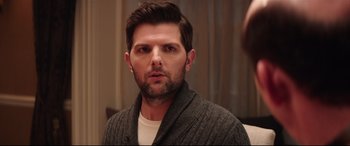 Movie still from “Krampus” (2015), directed by Michael Dougherty – A person wearing a sweater; Close Up shot, Over the shoulder angle