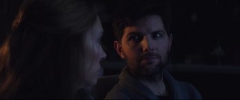 Movie still from “Krampus” (2015), directed by Michael Dougherty – A man and a woman looking at each other in the dark; Close Up shot, Over the shoulder angle