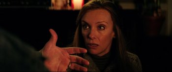 Movie still from “Krampus” (2015), directed by Michael Dougherty – A person talking to someone; Close Up shot, Over the shoulder angle