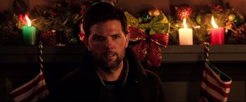 Movie still from “Krampus” (2015), directed by Michael Dougherty – A person wearing a jacket; Close Up shot, Over the shoulder angle