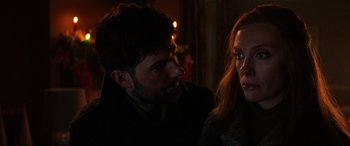 Movie still from “Krampus” (2015), directed by Michael Dougherty – A man and a woman looking at one another; Close Up shot, Over the shoulder angle