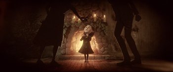 Movie still from “Krampus” (2015), directed by Michael Dougherty – A scene from the animated movie , the addams family; Wide shot, Over the shoulder angle