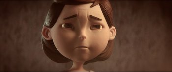 Movie still from “Krampus” (2015), directed by Michael Dougherty – The face of an animated character; Close Up shot, Over the shoulder angle