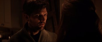 Movie still from “Krampus” (2015), directed by Michael Dougherty – A person wearing a sweater; Close Up shot, Over the shoulder angle