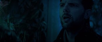 Movie still from “Krampus” (2015), directed by Michael Dougherty – A person smoking a cigarette; Close Up shot, Low angle