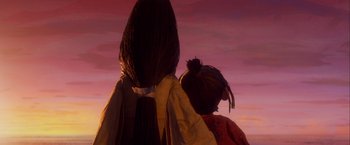 Movie still from “Kubo and the Two Strings” (2016), directed by Travis Knight – A couple of people standing next to each other on top of a hill; Close Up shot, Low angle