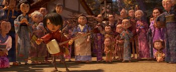 Movie still from “Kubo and the Two Strings” (2016), directed by Travis Knight – A group of people standing in front of each other; Wide shot, Low angle