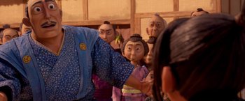Movie still from “Kubo and the Two Strings” (2016), directed by Travis Knight – A group of people standing next to each other; Medium shot, Over the shoulder angle