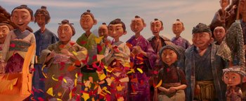 Movie still from “Kubo and the Two Strings” (2016), directed by Travis Knight – A group of people standing next to each other; Medium shot, Low angle