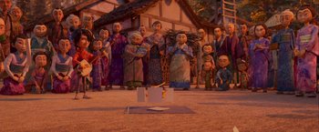 Movie still from “Kubo and the Two Strings” (2016), directed by Travis Knight – A group of people standing in front of a building; Wide shot, High angle