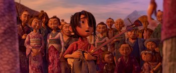 Movie still from “Kubo and the Two Strings” (2016), directed by Travis Knight – A group of people standing in a field; Medium shot, Over the shoulder angle