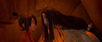 Movie still from “Kubo and the Two Strings” (2016), directed by Travis Knight – A doll with long black hair is next to another doll with long black hair; Close Up shot, Over the shoulder angle