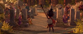 Movie still from “Kubo and the Two Strings” (2016), directed by Travis Knight – A little girl is holding a stick in a cemetery; Wide shot, Over the shoulder angle
