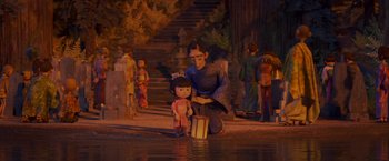 Movie still from “Kubo and the Two Strings” (2016), directed by Travis Knight – An animated scene of a man and a little girl by a lake; Wide shot, Over the shoulder angle