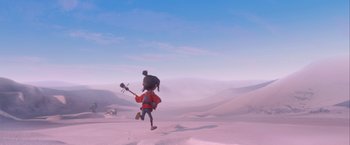 Movie still from “Kubo and the Two Strings” (2016), directed by Travis Knight – An animated person is running through the snow; Extreme Wide shot, High angle