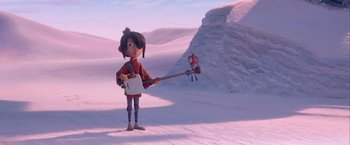 Movie still from “Kubo and the Two Strings” (2016), directed by Travis Knight – A person standing in the middle of a snow covered field; Wide shot, Low angle