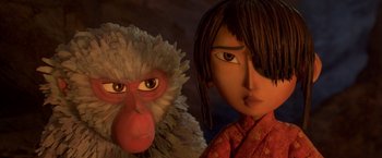 Movie still from “Kubo and the Two Strings” (2016), directed by Travis Knight – A woman and a monkey are standing next to each other; Close Up shot, Low angle