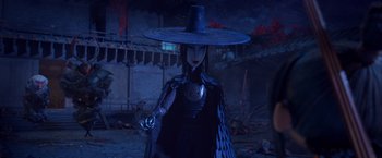 Movie still from “Kubo and the Two Strings” (2016), directed by Travis Knight – A doll wearing a hat and a long black dress; Medium shot, Low angle